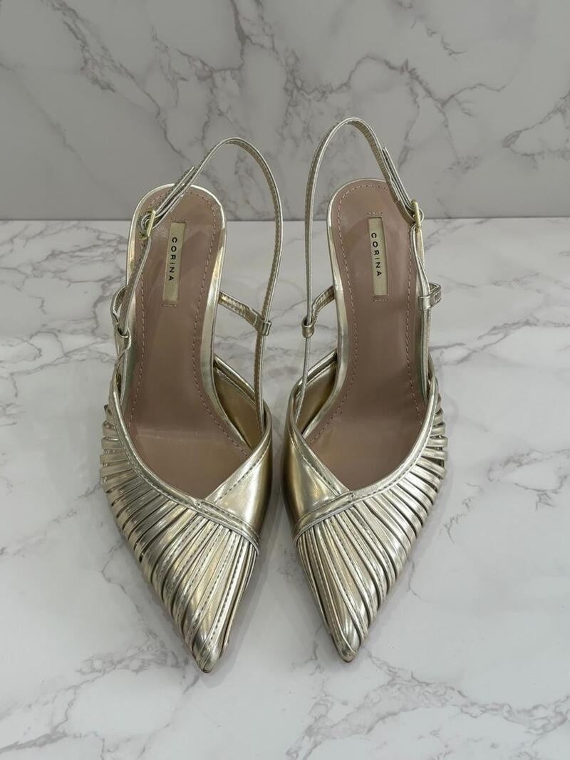 Zapato destalonado dorado