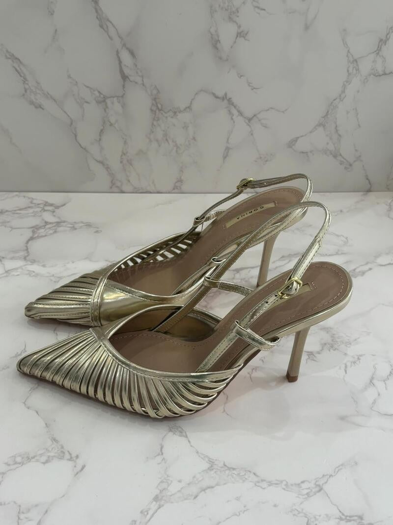 Zapato destalonado dorado