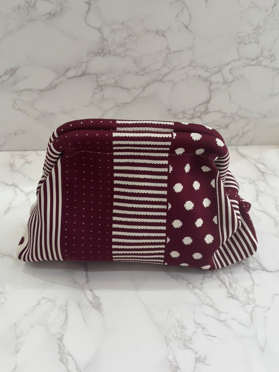 Bolso clutch burdeos rayas y puntos