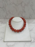 Collar ball jaspe naranja
